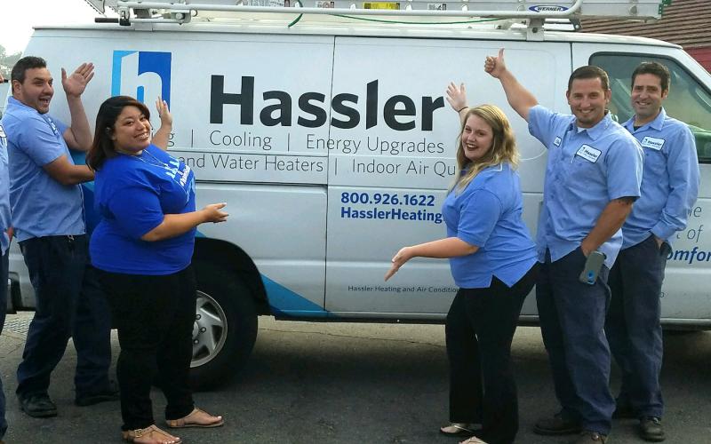 Hassler Heating team members in front of a truck in El Cerrito, CA