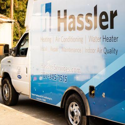 Hassler maintenance truck parked in a driveway