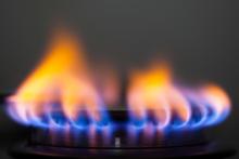 natural gas burner on stove up close